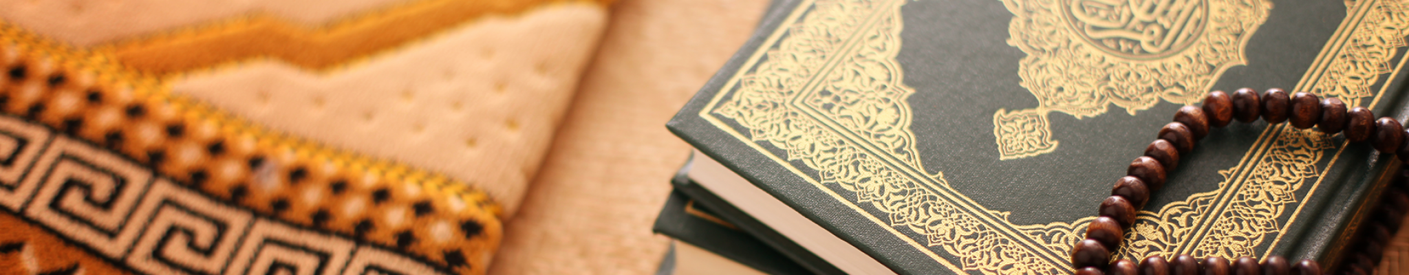 Quran and Beads on Rug